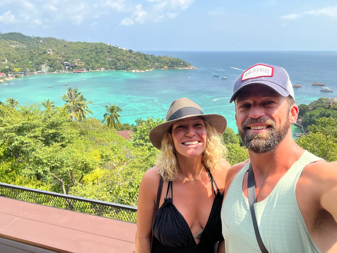 Matt and Kelly Clark overlooking a tropical bay in Thailand